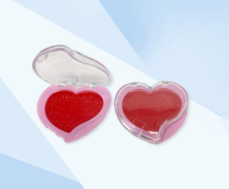 Faceted crystal heart shaped lustrous lip gloss